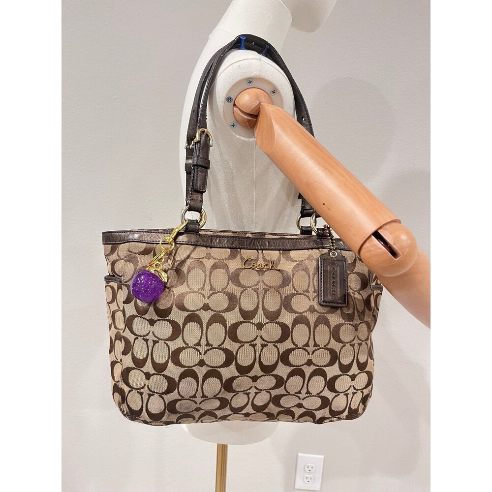 COACH GALLERY SIGNATURE monogram canvas tote.